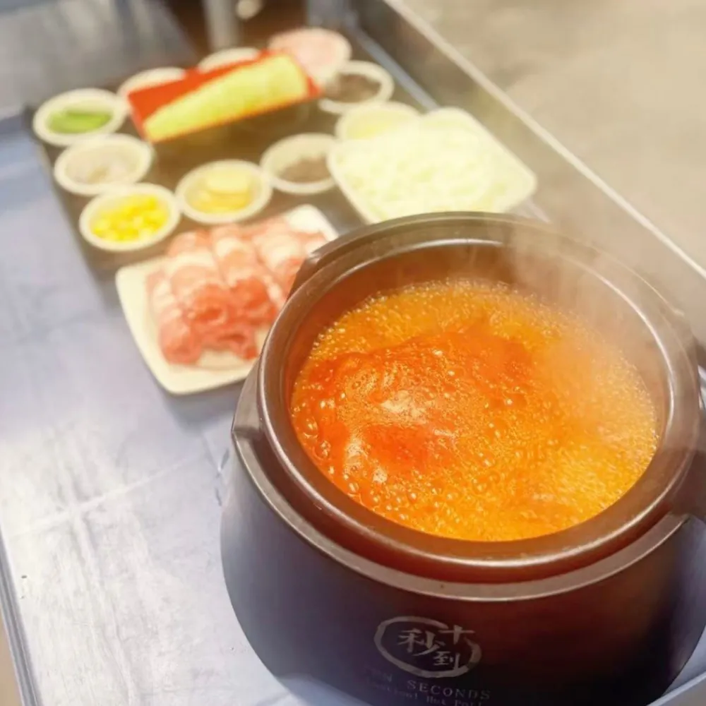 Tomato soup rice noodle set with fresh toppings at Ten Seconds Yunnan Rice Noodle, a Chinese Restaurant in Syosset